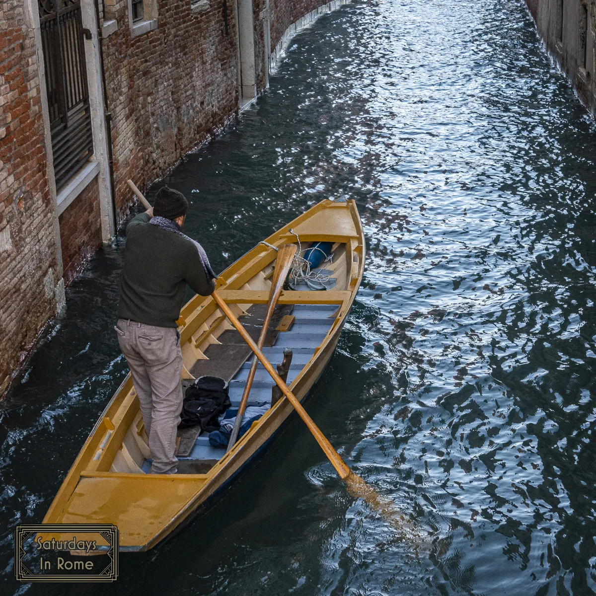 Rowing A Boat On A Canal