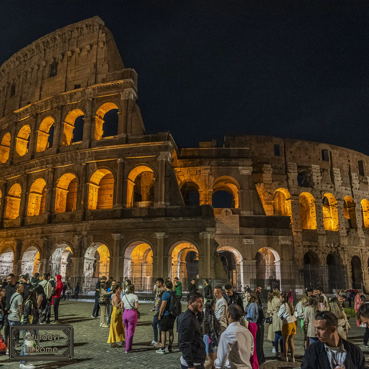 Crowds Outside The Colosseum At Night